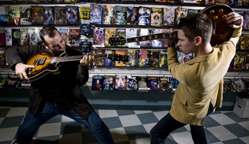 Kirby Krackle Press Photo WingDamage.com Site News "Guitar Battle!"